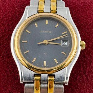 Vintage 1990's Bucherer Ladies Quartz Wristwatc hGold and Stainless Steele